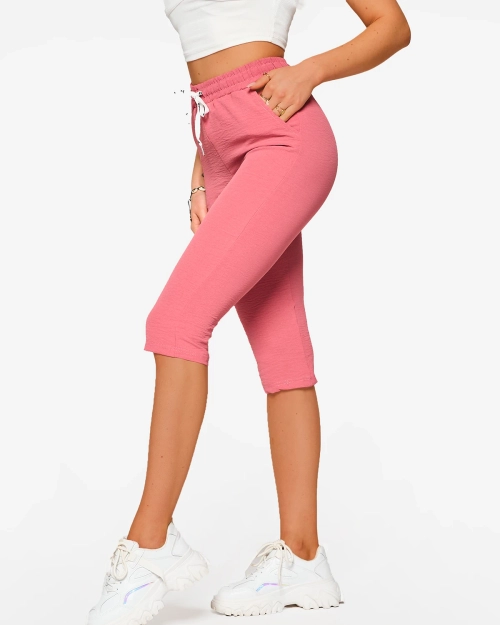 Темно-рожеві тканинні шорти для жінок 3/4 - Одяг