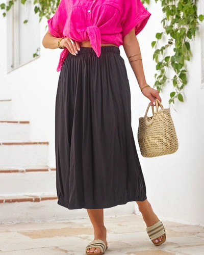 Royalfashion Dámská tkaná midi sukně, letní a splývavá s dvěma kapsami