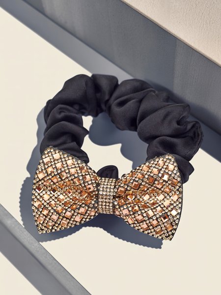 Royalfashion Gumička do vlasů s ozdobnou mašlí Bellissa