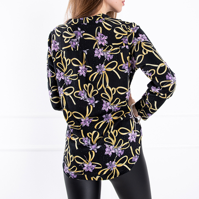 Чорна жіноча блузка з рослинним принтом