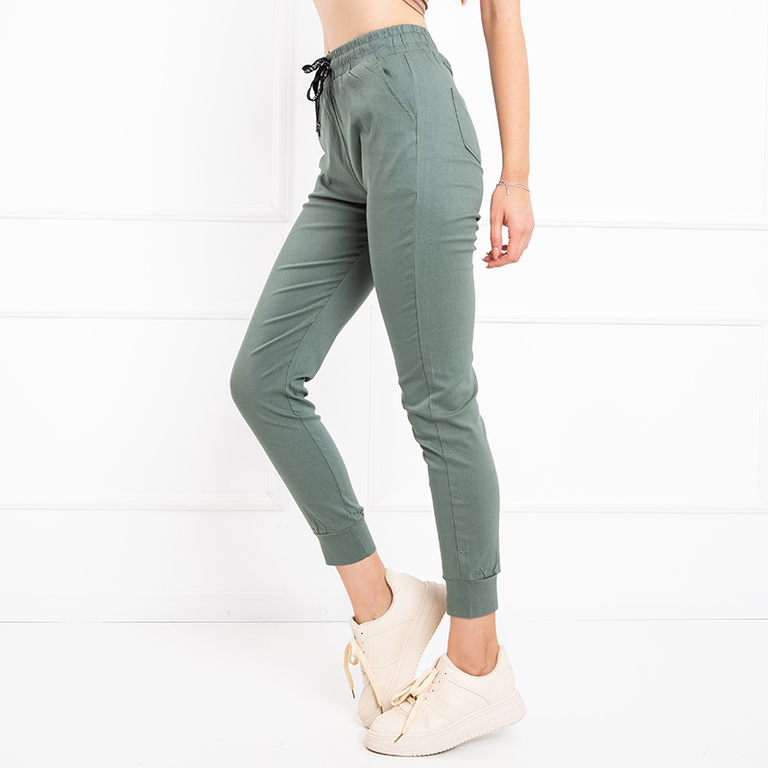 Zelené dámské kalhoty s kapsami - Oblečení