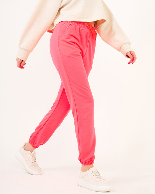 Спортивні штани неоново-рожевого кольору