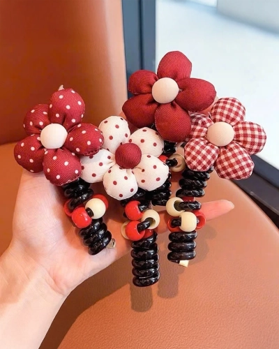 Royalfashion Gumička na vlasy s mašlí Ribbon Coil