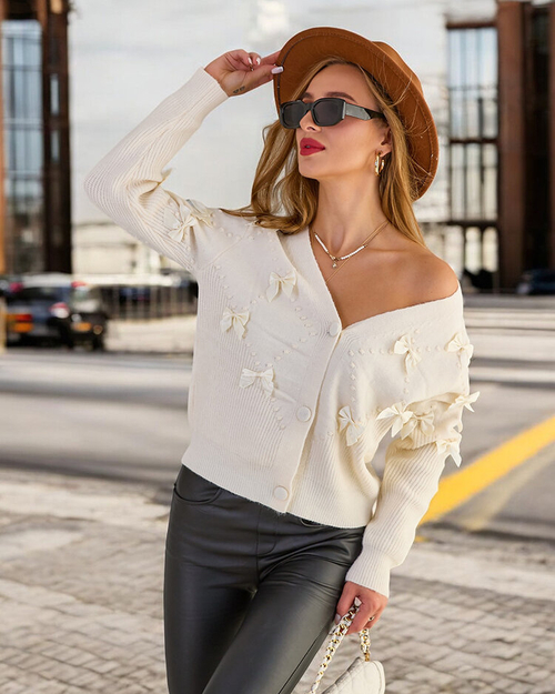 Жіночий светр Royalfashion на ґудзиках з бантами