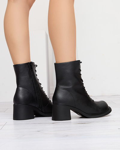 Чоботи жіночі чорні з ботильйонами на стовпі Caretti. Взуття