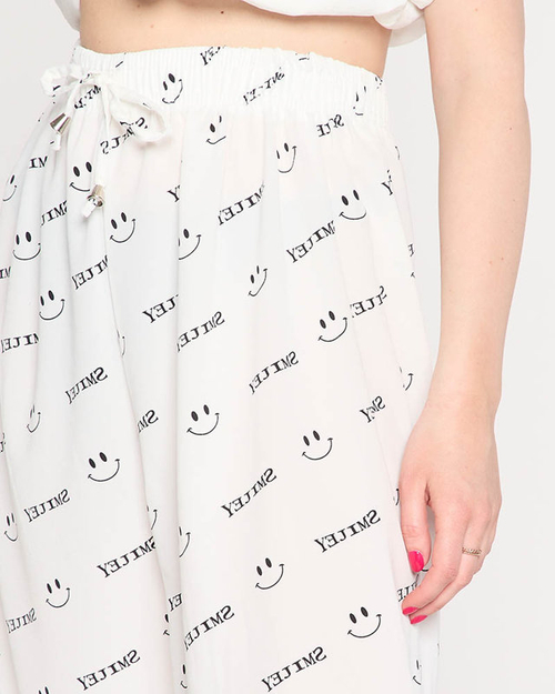 Білі жіночі штани з принтом