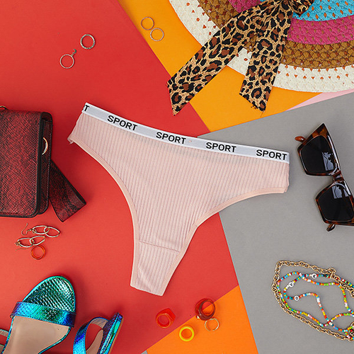 Світло-рожеві жіночі трусики стринги в рубчик - Нижня білизна