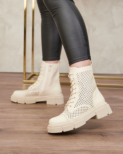 Prolamované béžové dámské kozačky na plochých podpatcích Rolika - Footwear
