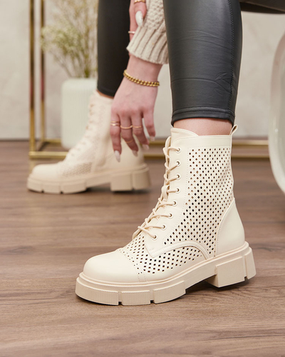 Prolamované béžové dámské kozačky na plochých podpatcích Rolika - Footwear