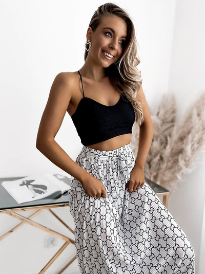 Біла жіноча плісирована спідниця максі з візерунками - Одяг