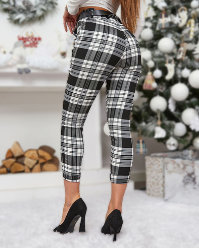 Royalfashion Жіночі біло-чорні штани в клітинку