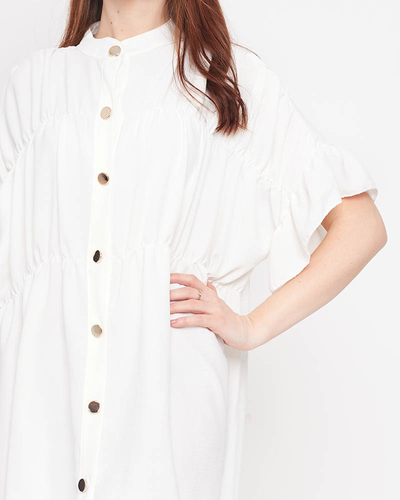 Біла жіноча сукня довжиною до колін