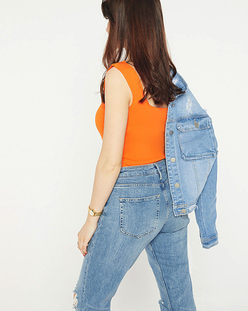 Помаранчевий топ з цирконами