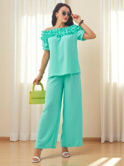 Royalfashion Жіноча комплектація з топом на одно плечо з короткими рукавами та декоративним вирізом, а також розкльошеними штанами