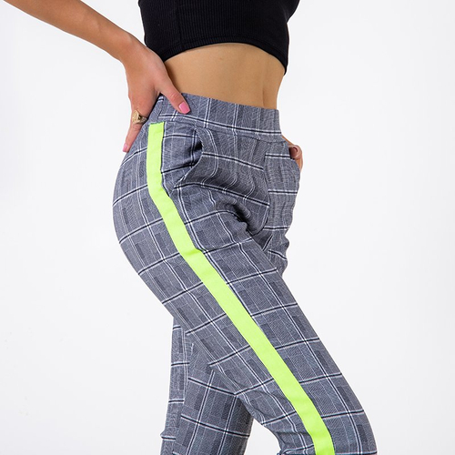 Сірі штани в клітинку з неоновими жовтими лампасами