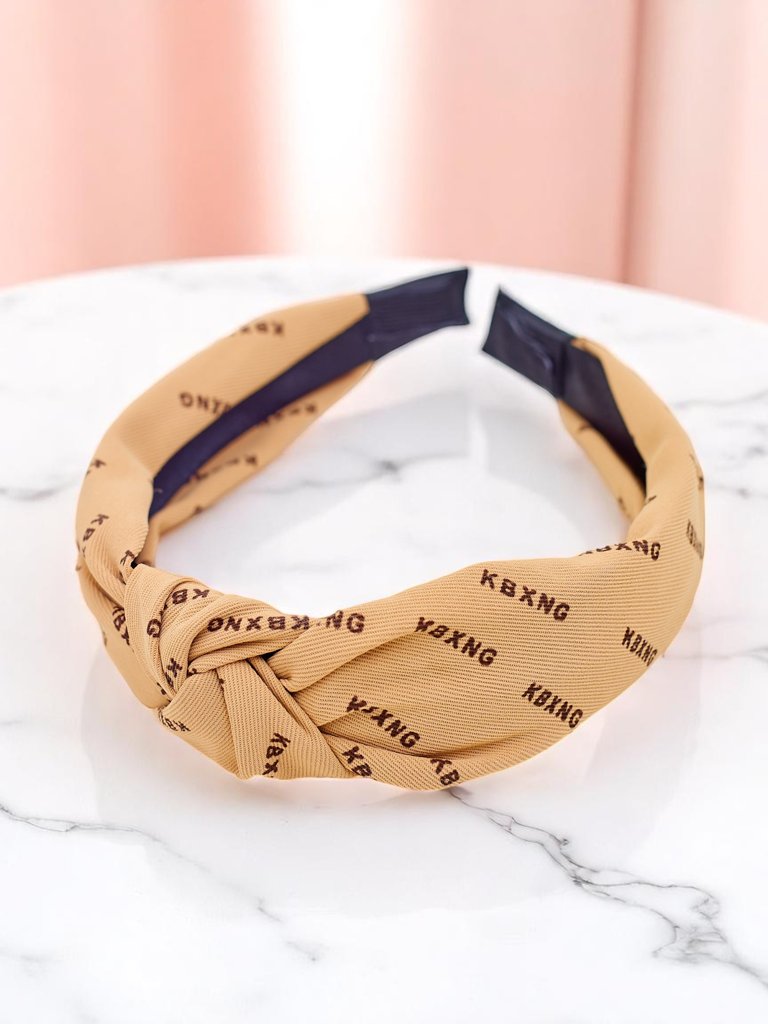 Royalfashion Pletená vzorovaná čelenka do vlasů Grafit Boom