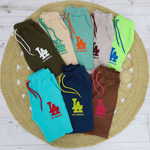 Жіночі бежеві спортивні штани з кольоровою нашивкою - Одяг