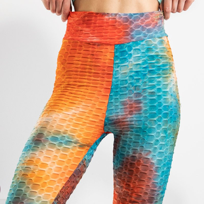 Oranžové dámské sportovní legíny - oblečení