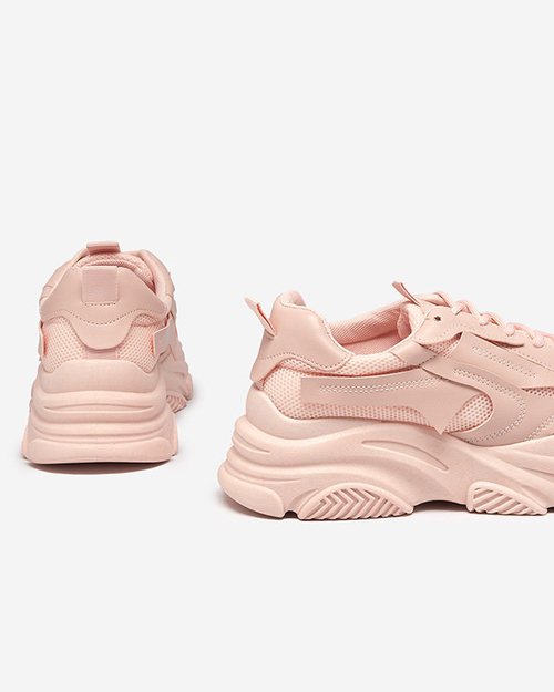 Рожеві жіночі кросівки на масивній підошві Okis