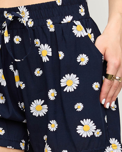 Темно-сині шорти з принтом ромашок