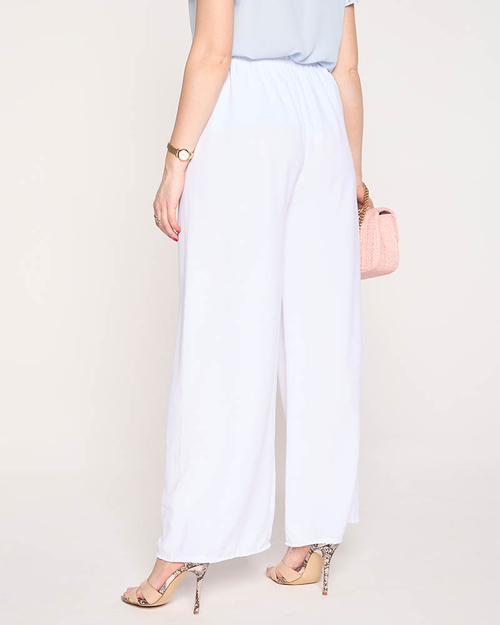 Широкі жіночі штани-палацо білого кольору - Одяг