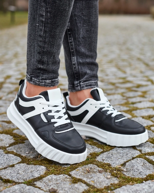 Жіночі повсякденні спортивні туфлі з екошкіри чорного кольору з білими вставками Netiris - Взуття