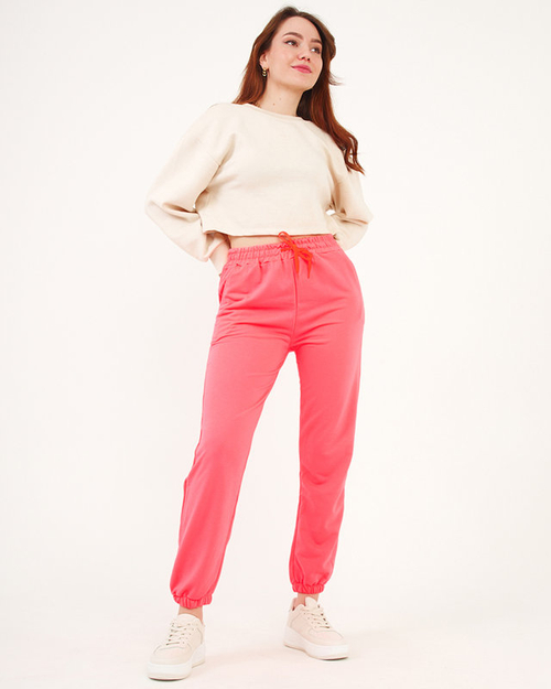 Спортивні штани неоново-рожевого кольору