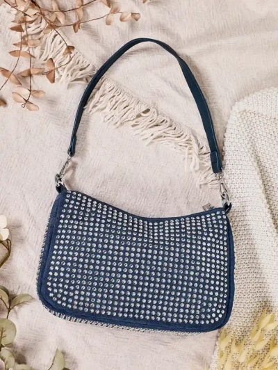 Royalfashion Malá dámská taška se cvočky