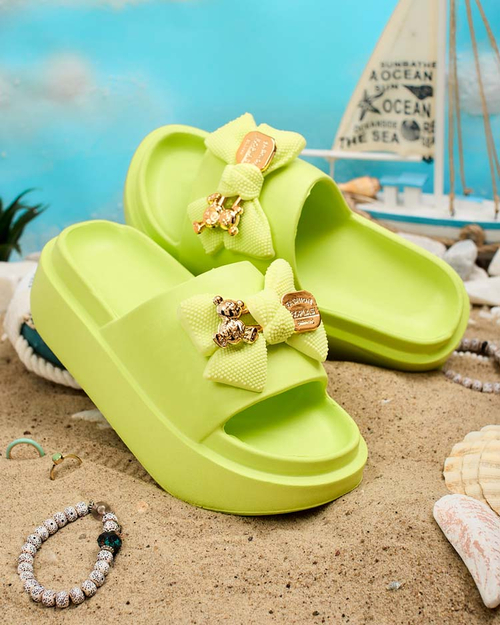 Royalfashion Жіночі гумові шльопанці з декоративним бантом Nilm