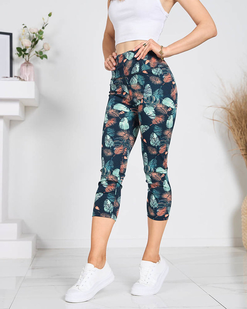 Зелені легінси довжиною в 3/4 з візерунком