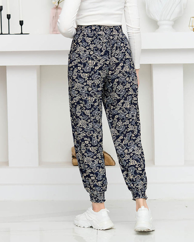 Námořnicky modré dámské kalhoty s béžovým potiskem PLUS SIZE - Oblečení