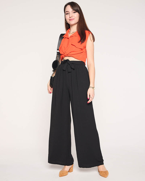 Жіночі широкі штани палаццо чорного кольору - Одяг