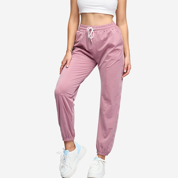 Tmavě růžové dámské joggery - Oblečení