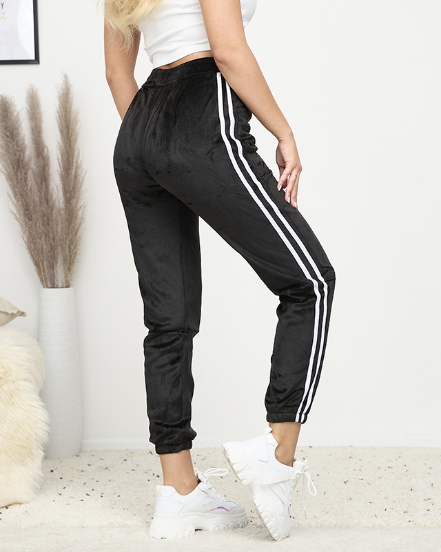 Černé dámské zateplené velurové tepláky s pruhy - Oblečení