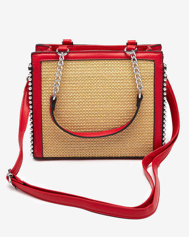 Червона жіноча сумочка з плетеною вставкою