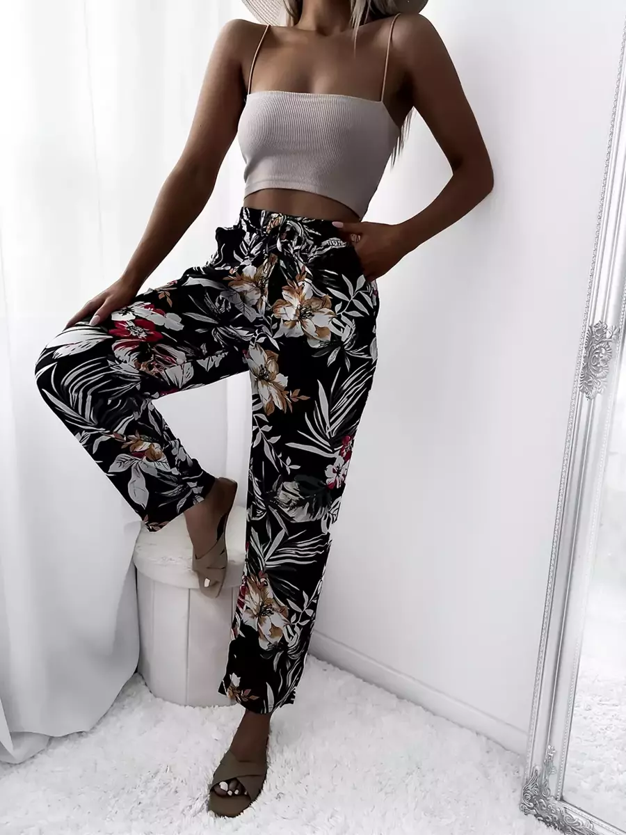 Чорні жіночі брюки з тканини з квітковим візерунком - Одяг