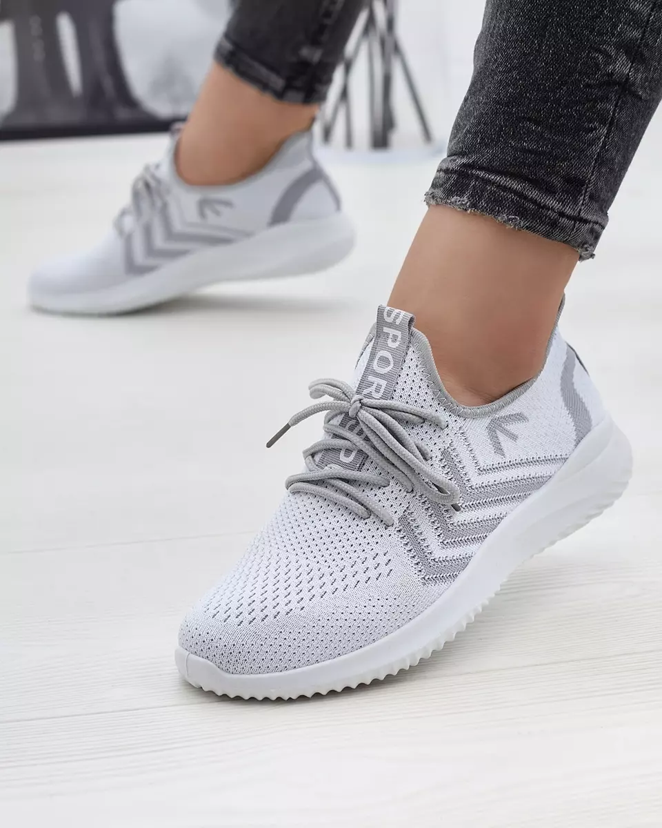 Тканинні жіночі спортивні кросівки білого кольору Leridis - Взуття