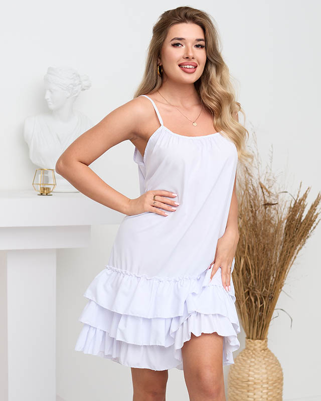 Жіноча біла сукня на бретелях з оборками - Одяг