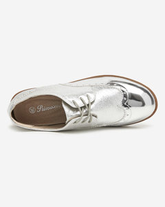 OUTLET Жіночі сріблясті туфлі з блискучими срібними вставками Retinisa - Взуття