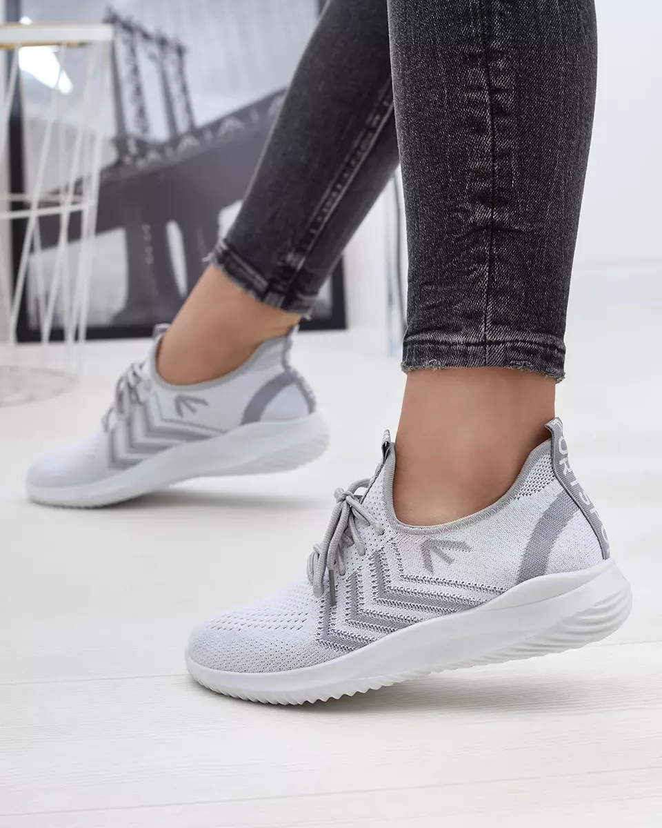 Тканинні жіночі спортивні кросівки білого кольору Leridis - Взуття