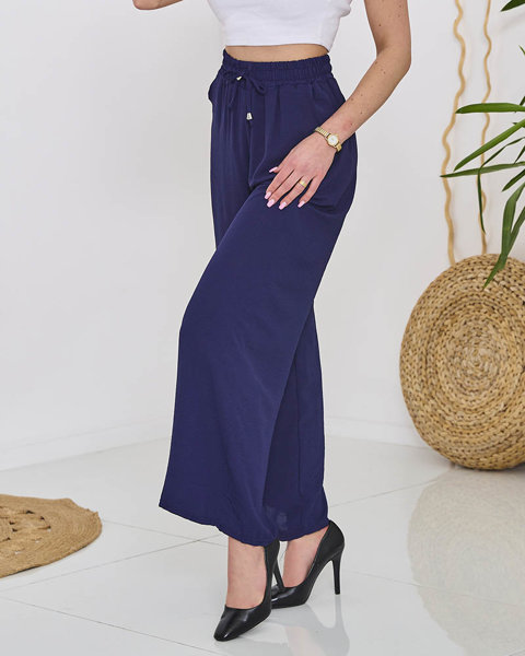 Жіночі широкі штани палаццо темно-синього кольору - Одяг