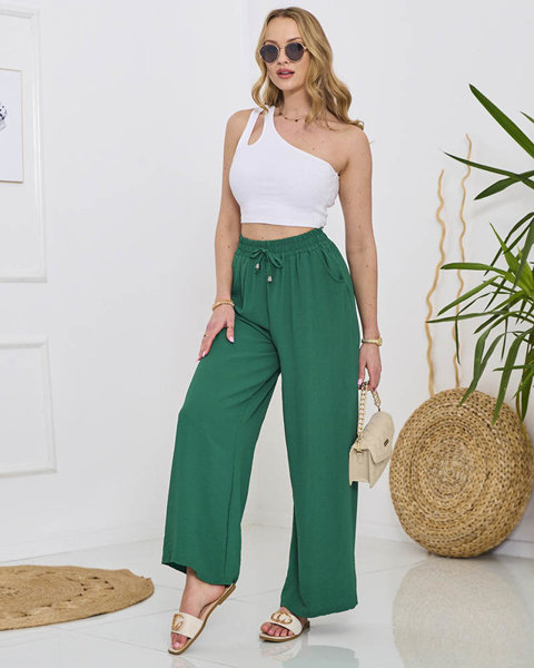 Жіночі широкі штани палаццо зеленого кольору - Одяг